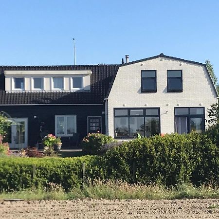 T Huuske Tuinappartement Met Fantastisch Uitzicht, Nabij Zee Zonnemaire Dış mekan fotoğraf