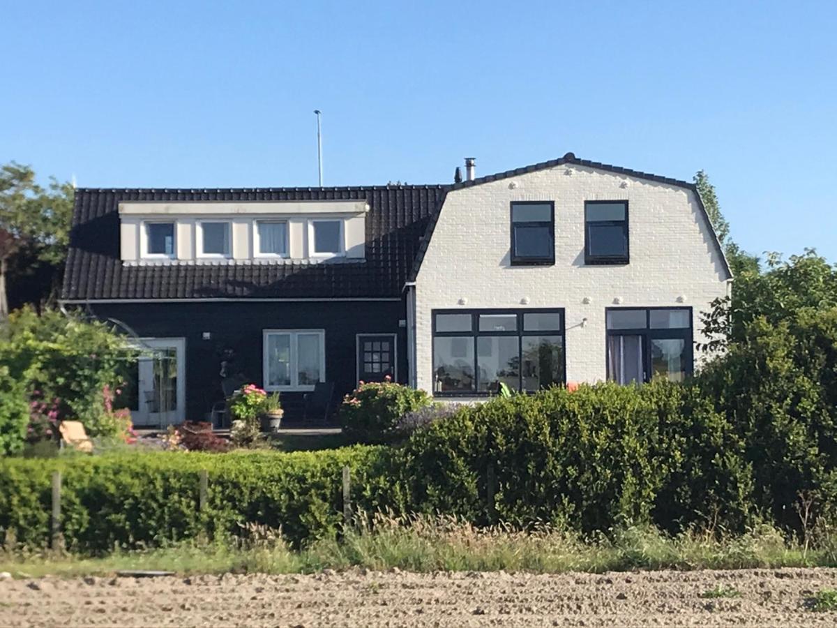 T Huuske Tuinappartement Met Fantastisch Uitzicht, Nabij Zee Zonnemaire Dış mekan fotoğraf