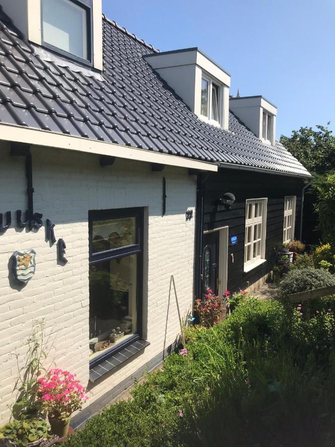 T Huuske Tuinappartement Met Fantastisch Uitzicht, Nabij Zee Zonnemaire Dış mekan fotoğraf