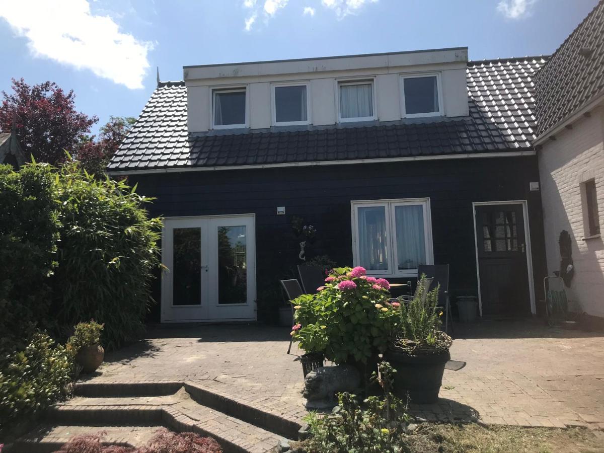 T Huuske Tuinappartement Met Fantastisch Uitzicht, Nabij Zee Zonnemaire Dış mekan fotoğraf
