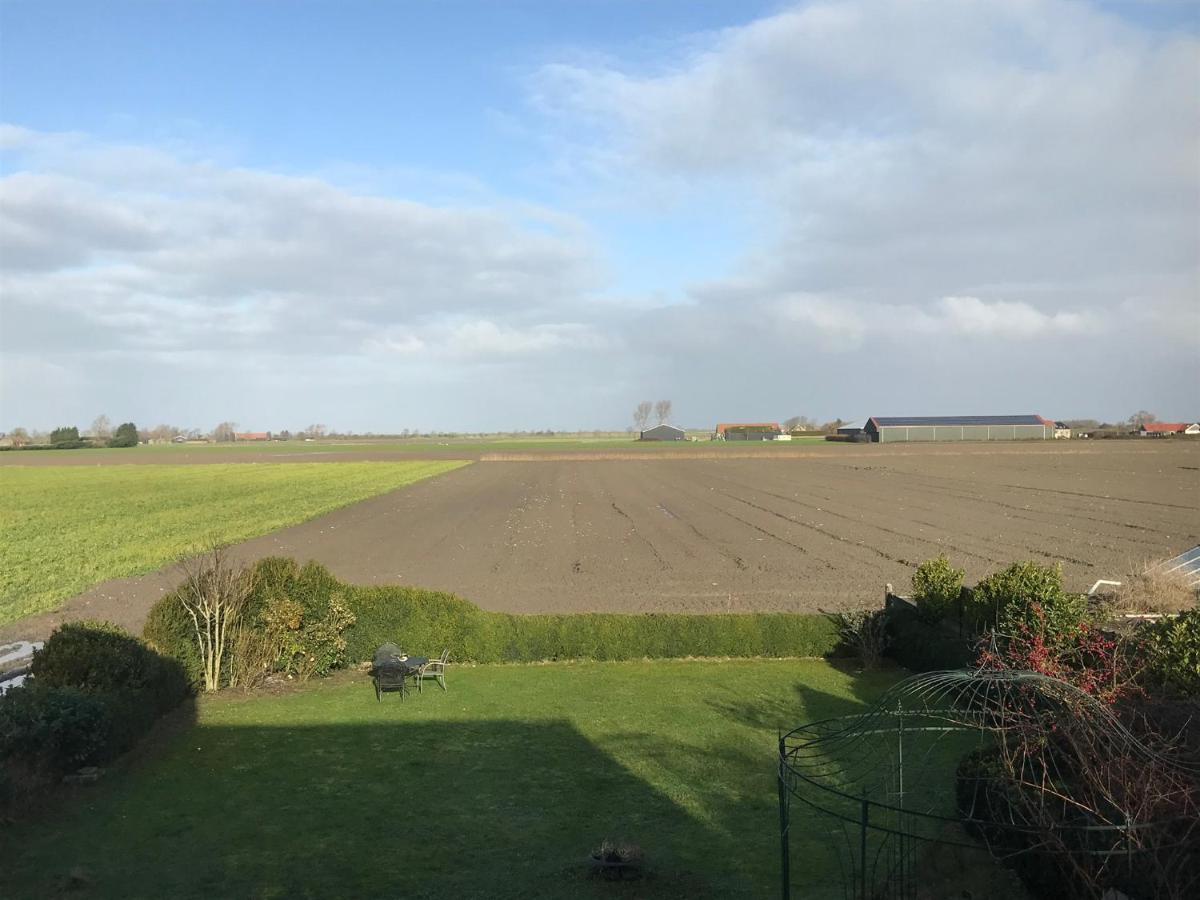 T Huuske Tuinappartement Met Fantastisch Uitzicht, Nabij Zee Zonnemaire Dış mekan fotoğraf