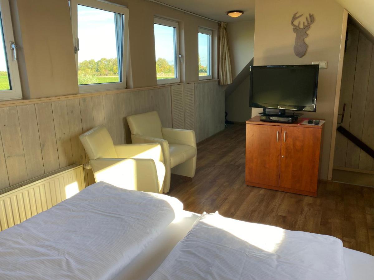 T Huuske Tuinappartement Met Fantastisch Uitzicht, Nabij Zee Zonnemaire Dış mekan fotoğraf