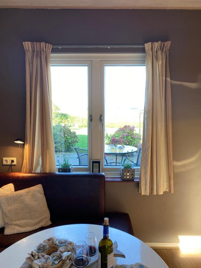 T Huuske Tuinappartement Met Fantastisch Uitzicht, Nabij Zee Zonnemaire Dış mekan fotoğraf